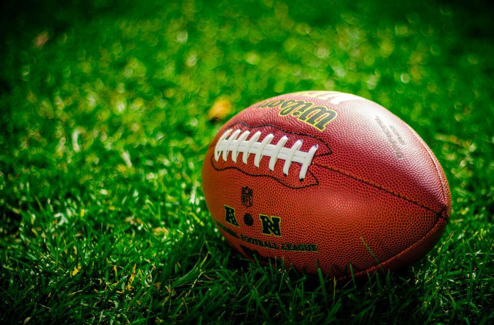 Close Up Of An American Football On Grass (1)